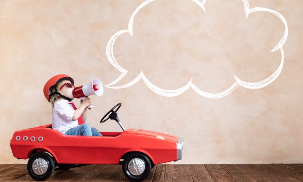 funny-kid-driving-toy-car-indoor 2 (1)